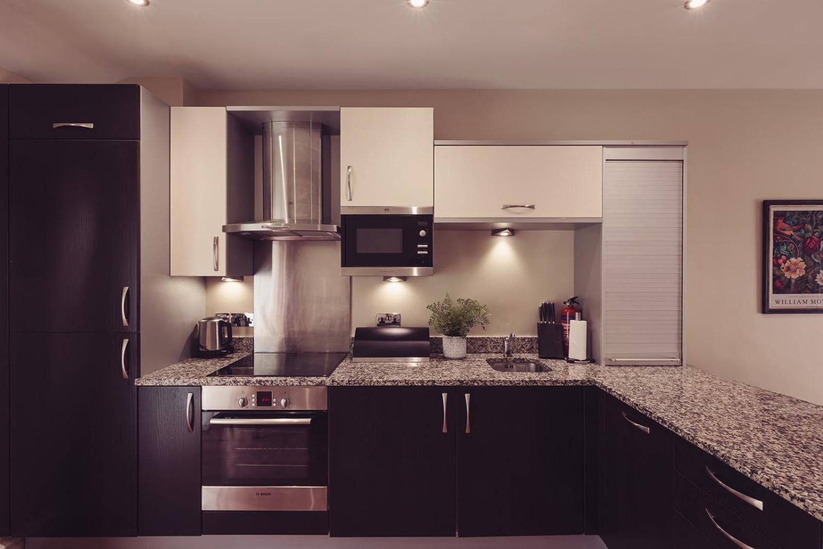 Longlands Inn & Cottages คาร์นฟอร์ธ ภายนอก รูปภาพ A modern kitchen